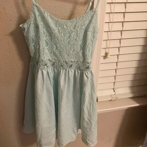 Cute mint mini dress with see through waistline!
